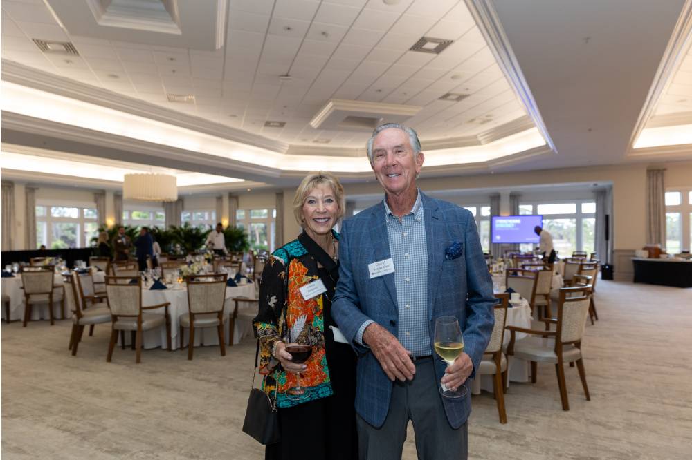 Guests Gwen Bergsma and David Vander Kam standing together and smiling at camera